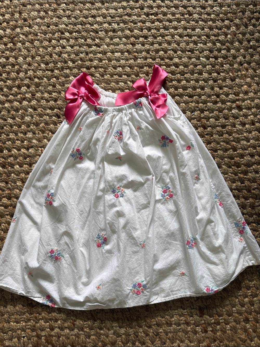 White Floral Girls' Skirt with Pink Bow Accents